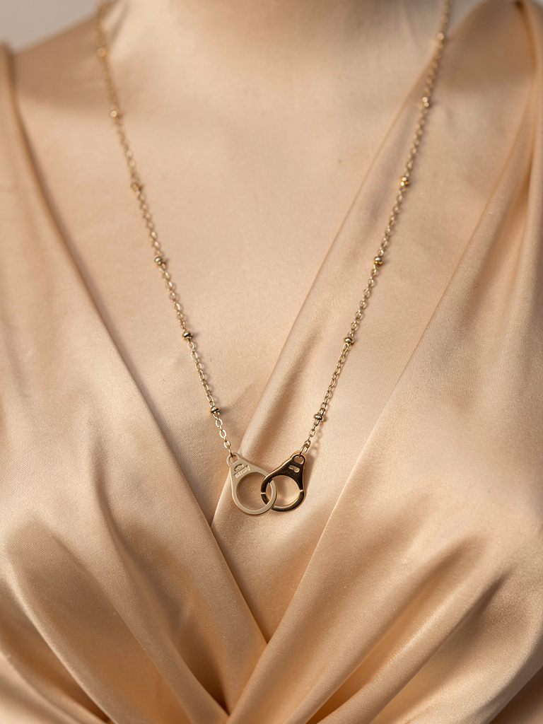 Collier attache éternelle doré